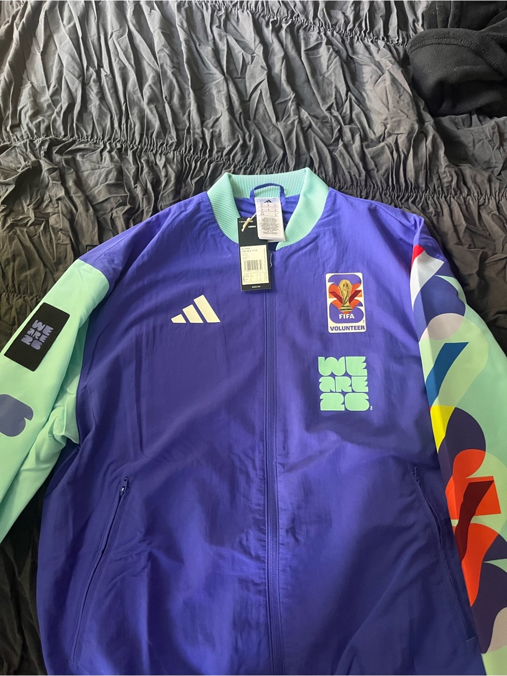 FIFA World Cup 2026 Blue Jacket with Mint Accents and Multicolor Sleeve